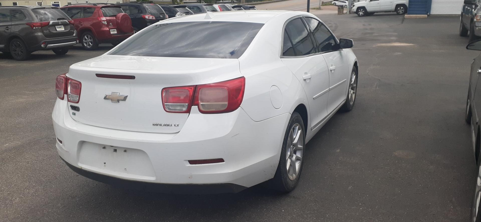 2014 Chevrolet Malibu 1LT (1G11C5SL9EF) with an 2.5L L4 DOHC 16V engine, 6-Speed Automatic transmission, located at 2015 Cambell Street, Rapid City, SD, 57701, (605) 342-8326, 44.066433, -103.191772 - Photo#3